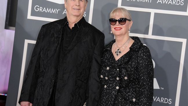 FILE - Musician Brian Wilson, left, and his wife Melinda Ledbetter Wilson arrive at the 55th annual Grammy Awards on Sunday, Feb. 10, 2013, in Los Angeles. (Photo by Jordan Strauss/Invision/AP, File)
