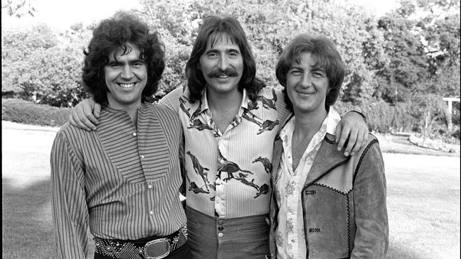 UNITED STATES - OCTOBER 02:  Photo of THREE DOG NIGHT and Chuck NEGRON and Cory WELLS and Danny HUTTON; Posed group portrait L-R Danny Hutton, Chuck Negron and Cory Wells  (Photo by Jim McCrary/Redferns)