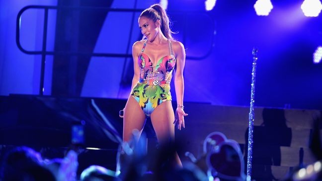 MIAMI BEACH, FL - JUNE 28:  Jennifer Lopez performs onstage at the iHeartRadio Ultimate Pool Party presented by VISIT FLORIDA at Fontainebleau's BleauLive at Fontainebleau Miami Beach on June 28, 2014 in Miami Beach, Florida.  (Photo by Larry Marano/Getty Images for Clear Channel)