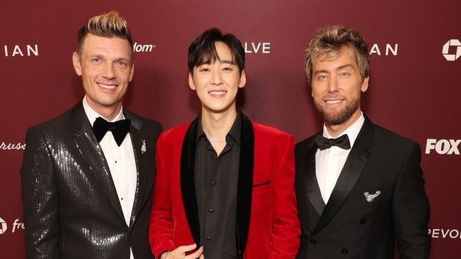 LOS ANGELES, CALIFORNIA - NOVEMBER 17: Nick Carter, Kevin Woo and Lance Bass attend the Christmas at The Grove: 24th Annual Tree Lighting Celebration on November 17, 2025 in Los Angeles, California. (Photo by Jesse Grant/Getty Images for Caruso)