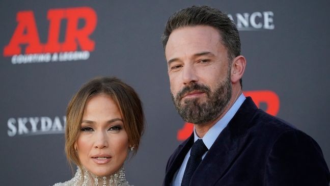 FILE - Jennifer Lopez and Ben Affleck arrive at the world premiere of "Air" on Monday, March 27, 2023, at the Regency Village Theatre in Los Angeles. (AP Photo/Ashley Landis, File)