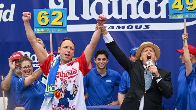 Hot dog eating champion Joey Chestnut is back for the 2025 competition.{&nbsp;} (Photo by Alexi J. Rosenfeld/Getty Images)