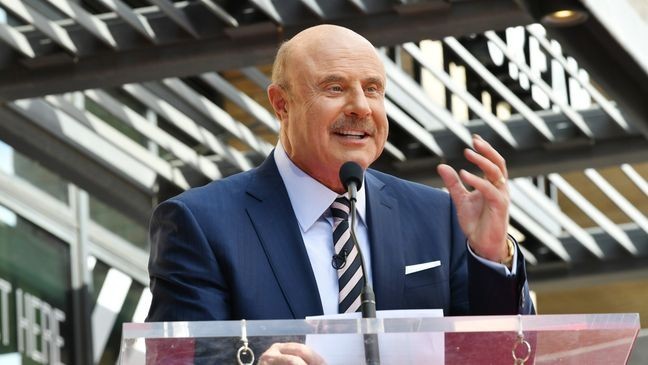 HOLLYWOOD, CALIFORNIA - FEBRUARY 21: Dr. Phil McGraw speaks at the ceremony honoring Dr. him with a star on The Hollywood Walk Of Fame on February 21, 2020 in Hollywood, California. (Photo by Amy Sussman/Getty Images)