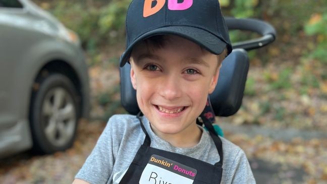 River Crouch dressed up as a Dunkin' Donuts worker for Halloween to show his love for the place. (Credit: Alliance Marketing Partners)