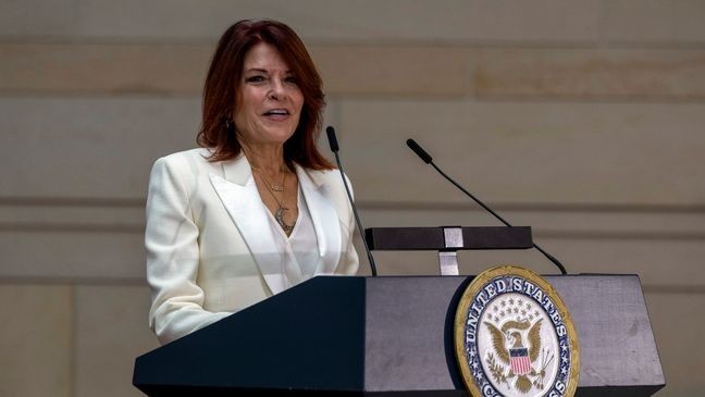 Rosanne Cash speaks at the unveiling of a bronze statue of her father, Johnny Cash, created by Little Rock sculptor Kevin Kresse, in Emancipation Hall at the Capitol in Washington, Tuesday, Sept. 24, 2024. (AP Photo/Ben Curtis)