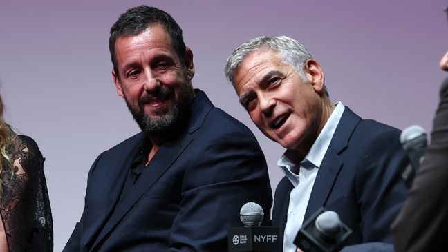 NEW YORK, NEW YORK - SEPTEMBER 29: (L-R) Adam Sandler and George Clooney speak onstage at the "Jay Kelly" Intro/Q&A during the 63rd New York Film Festival at Alice Tully Hall, Lincoln Center on September 29, 2025 in New York City. (Photo by Cindy Ord/Getty Images for FLC)