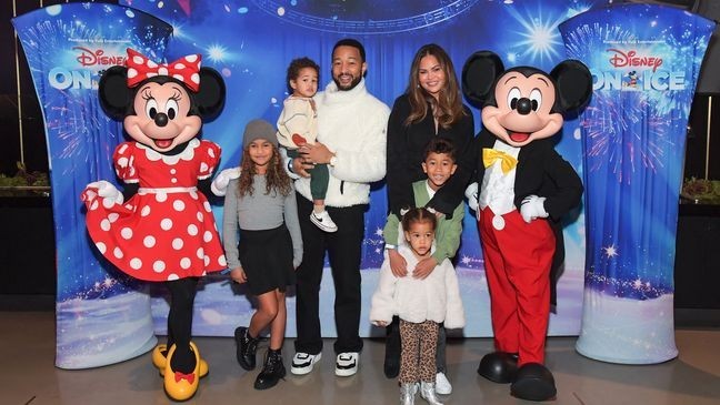 LOS ANGELES, CALIFORNIA - DECEMBER 20: (L-R) Luna Simone Stephens, Wren Stephens, John Legend, Chrissy Teigen, Esti Maxine Stephens, and Miles Theodore Stephens attend Disney On Ice Presents Let's Dance! at Crypto.com Arena on December 20, 2025 in Los Angeles, California. (Photo by Charley Gallay/Getty Images for Feld Entertainment, Inc.)