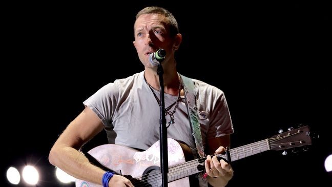 LAS VEGAS, NEVADA - SEPTEMBER 21: Chris Martin of Coldplay performs onstage at the 2024 iHeartRadio Music Festival at T-Mobile Arena on September 21, 2024 in Las Vegas, Nevada. (Photo by Kevin Winter/Getty Images for iHeartRadio)