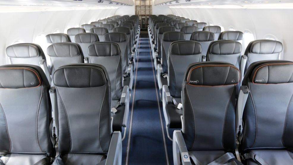 FILE - This Thursday, March 16, 2017, file photo shows the interior of a commercial airliner at John F. Kennedy International Airport in New York. (AP Photo/Seth Wenig, File)