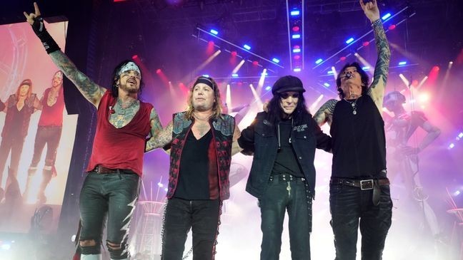 WASHINGTON, DC - JUNE 22: Nikki Sixx, Vince Neil, Mick Mars and Tommy Lee of Mötley Crüe perform onstage during The Stadium Tour at Nationals Park on June 22, 2022 in Washington, DC. (Photo by Kevin Mazur/Getty Images for Live Nation)