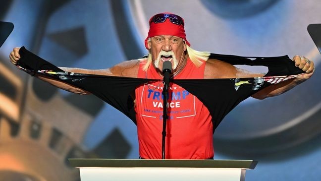 TOPSHOT - US pro-wrestler Hulk Hogan rips his shirt off to reveal a Trump-Vance campaign shirt during the last day of the 2024 Republican National Convention at the Fiserv Forum in Milwaukee, Wisconsin, on July 18, 2024. Donald Trump will get a hero's welcome Thursday as he accepts the Republican Party's nomination to run for US president in a speech capping a convention dominated by the recent attempt on his life. (Photo by ANDREW CABALLERO-REYNOLDS / AFP) (Photo by ANDREW CABALLERO-REYNOLDS/AFP via Getty Images)