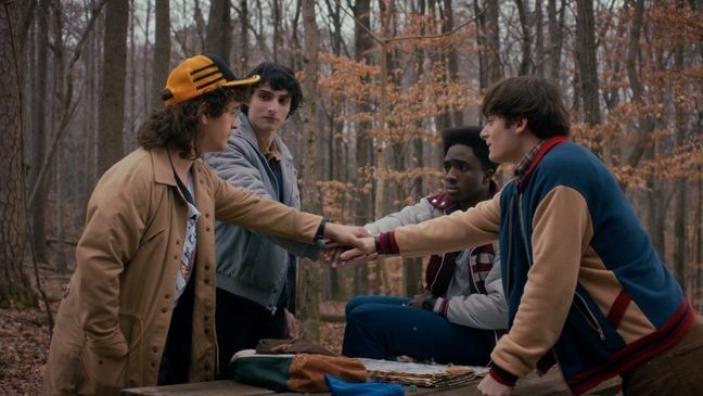 STRANGER THINGS. (L to R) Gaten Matarazzo as Dustin Henderson, Finn Wolfhard as Mike Wheeler, Caleb McLaughlin as Lucas Sinclair, and Noah Schnapp as Will Byers in STRANGER THINGS. Cr. Courtesy of Netflix ©{&nbsp;}2025