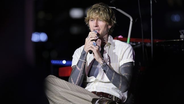 LOS ANGELES, CALIFORNIA - OCTOBER 01: mgk speaks onstage at The Drop: mgk at GRAMMY Museum L.A. Live on October 01, 2025 in Los Angeles, California. (Photo by Rebecca Sapp/Getty Images for The Recording Academy)