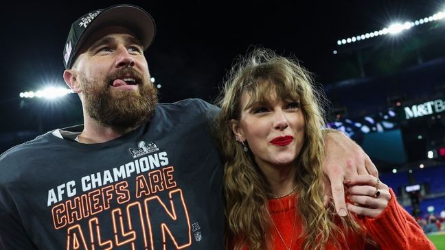 BALTIMORE, MARYLAND - JANUARY 28: Travis Kelce #87 of the Kansas City Chiefs (L) celebrates with Taylor Swift after defeating the Baltimore Ravens in the AFC Championship Game at M&T Bank Stadium on January 28, 2024 in Baltimore, Maryland. (Photo by Patrick Smith/Getty Images)