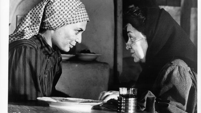 Norma Crane serves tea to Molly Picon, Yente,{&nbsp;} in a scene from the film "Fiddler On The Roof." (Photo by United Artists/Getty Images)