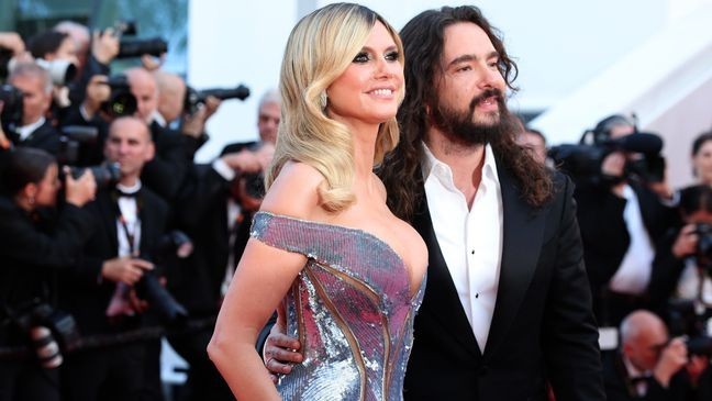 Heidi Klum met Tom Kaulitz at a party, one she says she almost skipped. (Photo by Gisela Schober/Getty Images)