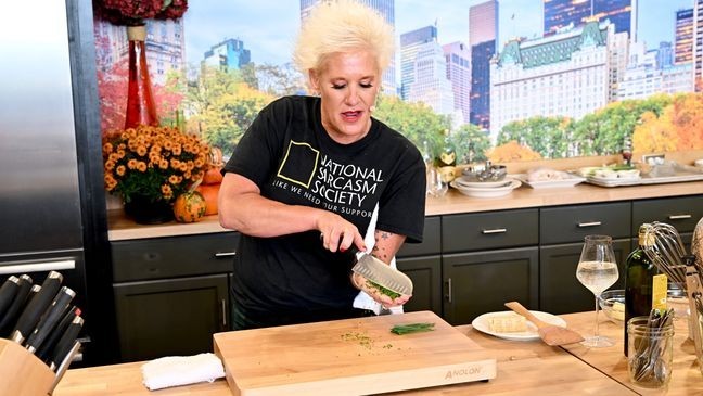 NEW YORK, NEW YORK - OCTOBER 15: Anne Burrell makes a culinary presentation during the Food Network New York City Wine & Food Festival presented by Capital One - Grand Tasting featuring Culinary Demonstrations presented by Liebherr Appliances on October 15, 2022 in New York City. (Photo by Dave Kotinsky/Getty Images for NYCWFF)
