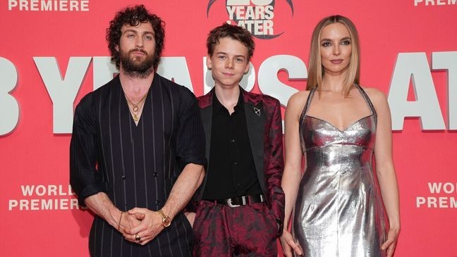 (L-R) Aaron Taylor-Johnson, Alfie Williams and Jodie Comer at the World premiere of 28 Years Later in London. (Credit: Scott A Garfitt/Invision/AP)