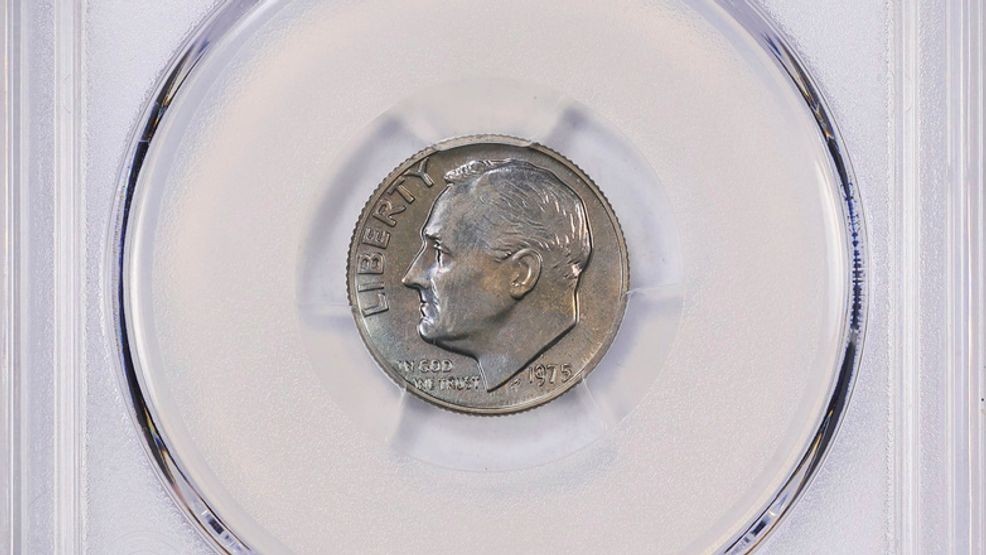 This undated image provided by GreatCollections shows a 1975 proof set dime mistakenly made without the San Francisco Mint’s letter S mintmark. (GreatCollections via AP)