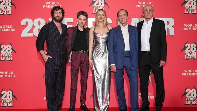 (L-R) Aaron Taylor-Johnson, Alfie Williams, Jodie Comer, Ralph Fiennes and director Danny Boyle at the World premiere of '28 Years Later' in London. (Credit: Scott A Garfitt/Invision/AP)