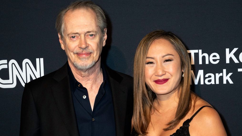 Steve Buscemi and his girlfriend, Karen Ho, arrive on the red carpet for the 24th Annual Mark Twain Prize for American Humor at the Kennedy Center for the Performing Arts, Sunday, March 19, 2023, in Washington. (AP Photo/Kevin Wolf)