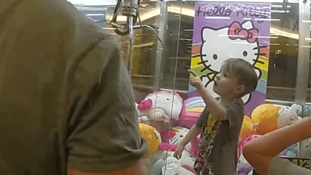 Toddler rescued after becoming trapped in claw machine (Queensland Police Department)