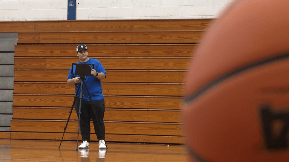 Gate City basketball manager Jacob "Bobo" Bowman filming practice (WCYB Photo)