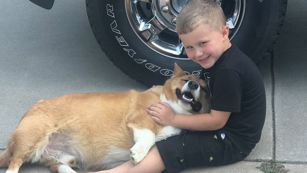 Austyn Ladd with a dog. (Photo: Jolene Ladd)