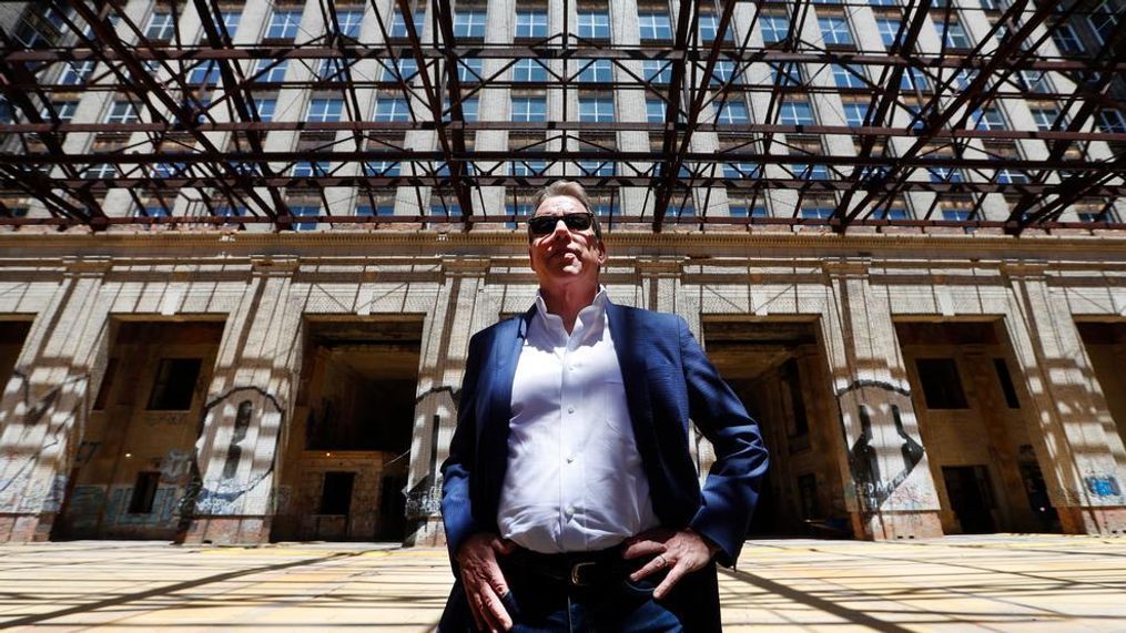 In this Thursday, June 14, 2018 photo, Bill Ford Jr., Ford Motor Company Executive Chairman and Chairman of the Board, poses in the Michigan Central Station in Detroit. Ford Motor Co. is embarking on a 4-year renovation of the 105-year-old depot and 17-story office tower just west of downtown. The massive project is expected to increase the automaker’s footprint in the city where the company was founded, provide space for electric and autonomous vehicle testing and research and spur investment in the surrounding neighborhood. (AP Photo/Paul Sancya)