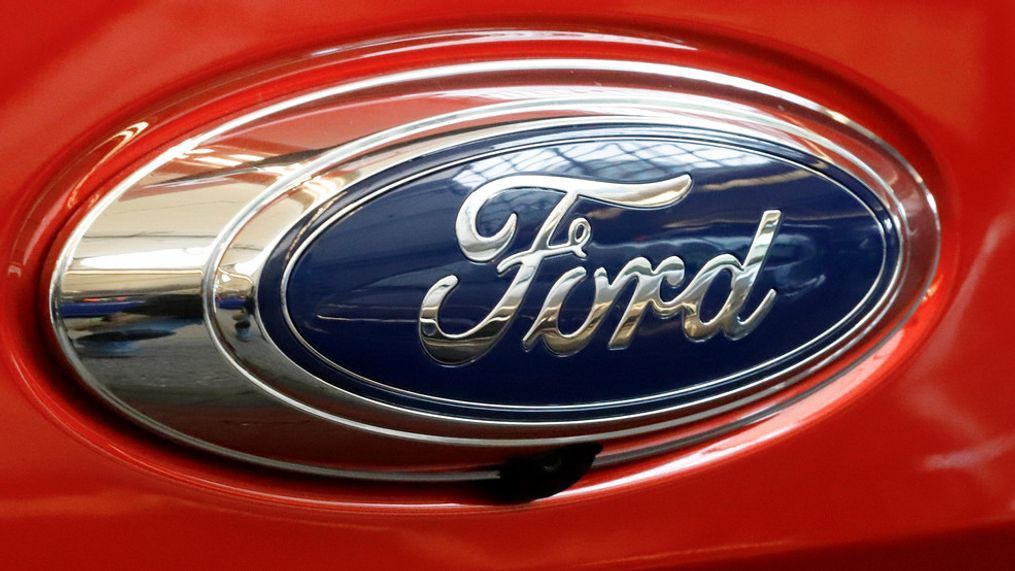 FILE- In this Feb. 14, 2019, file photo this is the Ford logo on a 2019 Ford Ranger 2019 Supercrew 4x4 on display at the 2019 Pittsburgh International Auto Show in Pittsburgh. Ford says it has launched an investigation into whether a flawed mathematical model caused it to overstate gas mileage and understate pollution from a wide range of vehicles. The company says a group of employees reported possible problems with the model in September. So it has hired an outside firm to test the 2019 Ford Ranger. (AP Photo/Gene J. Puskar, File)