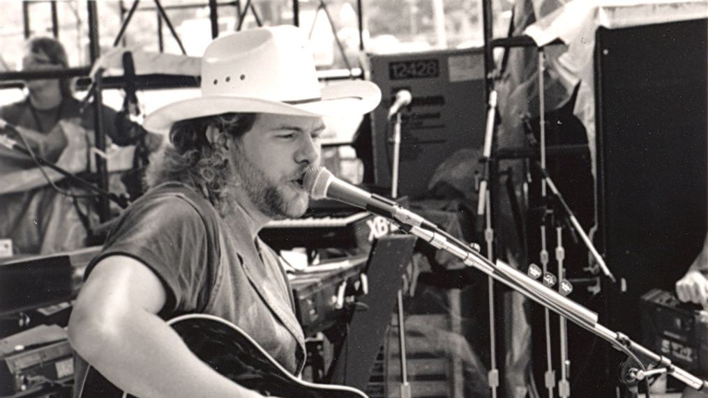 Managing a broken ankle from a football game, Toby Keith, gets up on stage to perform Tuesday, June 7 in the Mercury & Polydor during the 23rd Annual Fan Fair 1994, The World's Biggest Country Music Festival in Downtown Nashville.{&nbsp;}(Photo courtesy CMA)