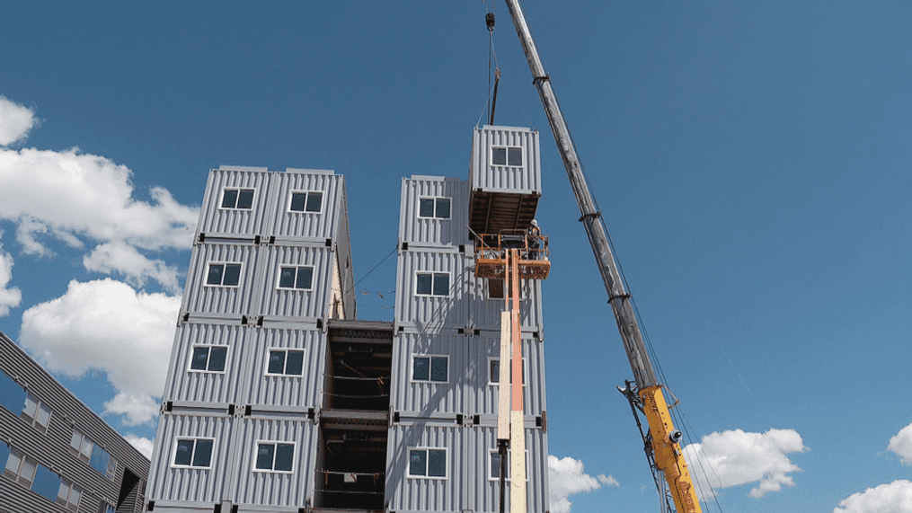 Friday, the final piece was put into place on a six-story apartment complex in Salt Lake City built solely out of shipping containers. (Photo: Mark Less, KUTV)