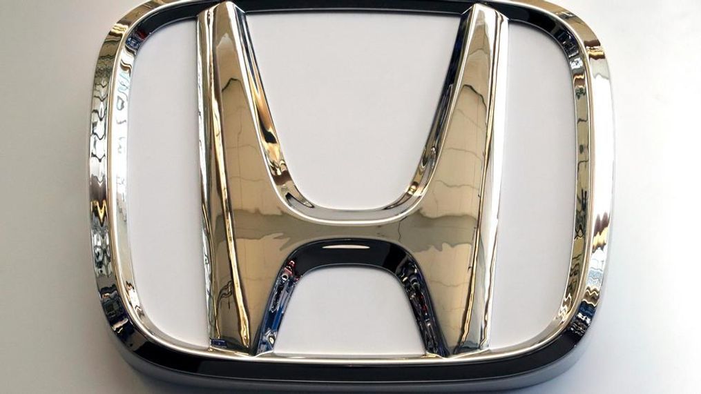 In this Feb. 14, 2019, photo, this photo shows the Honda logo on a sign at the 2019 Pittsburgh International Auto Show in Pittsburgh. (AP Photo/Gene J. Puskar)