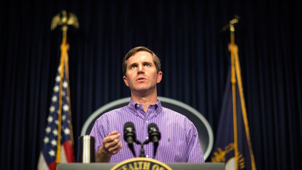 In this Sunday, March 29, 2020, photo, Kentucky Gov. Andy Beshear speaks during a news conference at the state Capitol in Frankfort, Ky., to provide an update on the novel coronavirus. (Ryan C. Hermens/Lexington Herald-Leader via AP)