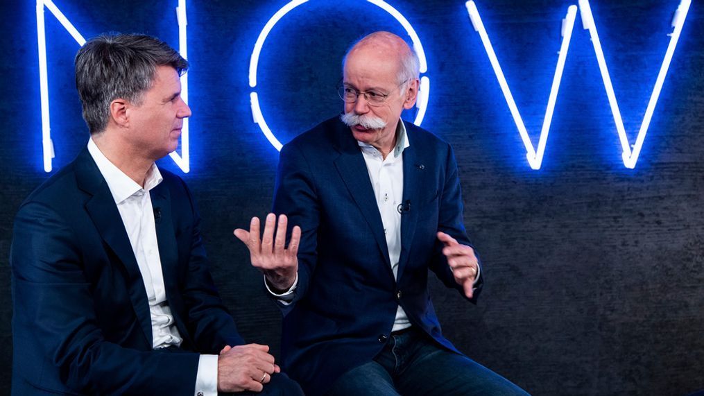 In this Friday, Feb. 22, 2019 photo Harald Krueger, left, CEO of the car manufacturer BMW, and Dieter Zetsche, right, CEO of the Daimler stock company and the car manufacturer Mercedes Benz, talk during a press conference in Berlin, Germany. Automakers BMW and Daimler said on Thursday, Feb 28, 2019 they will work together on developing the automated driving technology expected to transform the industry in the years ahead. (Bernd von Jutrczenka/dpa via AP, file)