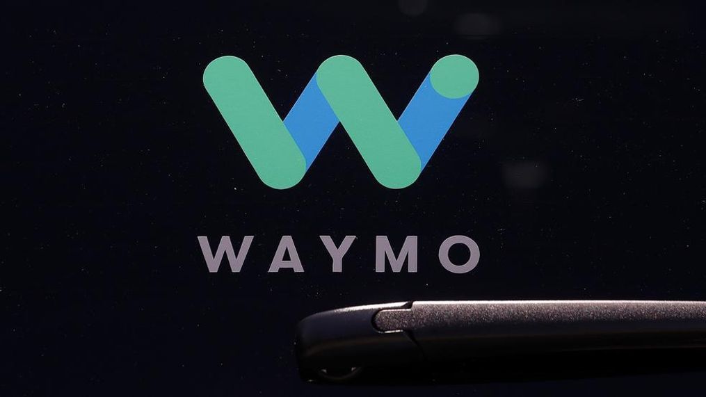 FILE - This Tuesday, May 8, 2018, file photo shows a Waymo logo displayed on the window of a car at the Google I/O conference in Mountain View, Calif.{&nbsp;} (AP Photo/Jeff Chiu, File)