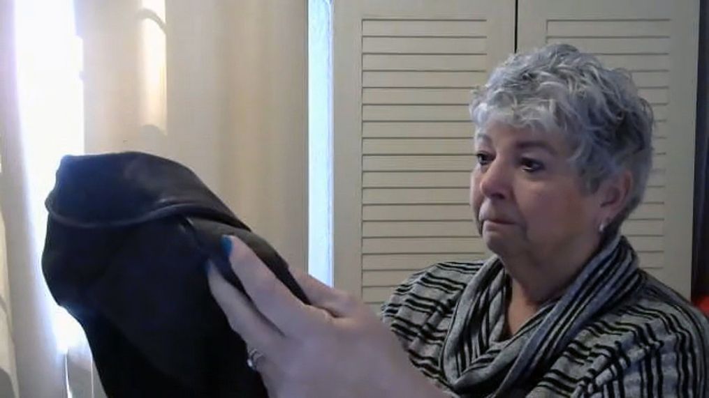 Teri Sargent holds the jacket her father, Miles F. Blum, wore in World War II. It was sent to her from a man in Molalla, Oregon, whose uncle had found it in the 1950s.  (KATU)