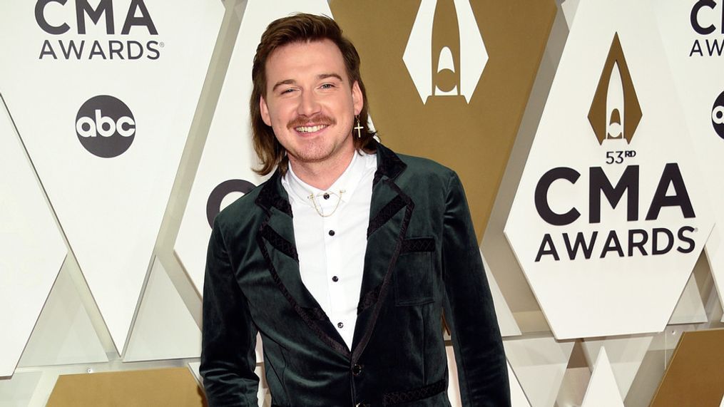 FILE - Morgan Wallen arrives at the 53rd annual CMA Awards on Nov. 13, 2019, in Nashville, Tenn. Wallen will still be eligible for multiple awards at this year's CMA Awards, but not the show's top prize. The disgraced country singer apologized after he was caught on camera using a racial slur in February. The Country Music Association's Board of Directors voted that Wallen won't be eligible for individual artist awards, such as entertainer of the year and male vocalist. (Photo by Evan Agostini/Invision/AP, File)