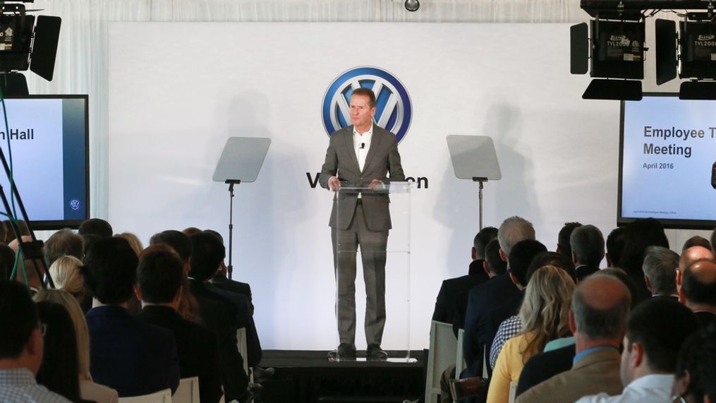 In this 2016 file photo, Volkswagen Group CEO Herbert Diess{&nbsp;}speaks to employees at the Herndon headquarters of Volkswagen of America, Inc. Diess said in an interview this week that the company has already sourced the batteries for 50 million electric cars to be built on the modular electric (MEB) platform alone. (Image courtesy of Volkswagen of America)