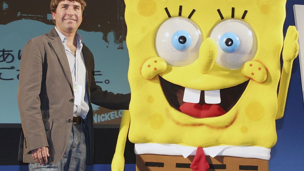 FILE – Stephen Hillenburg, the writer of a U.S. cartoon "The SpongeBob SquarePants" poses with its charactor SpongeBob SquarePants at an event held at Tokyo International Anime Fair on March 23, 2006 in Tokyo, Japan. (Photo by Junko Kimura/Getty Images)