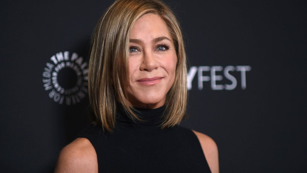 FILE - Jennifer Aniston arrives at a screening of "The Morning Show" during PaleyFest, April 12, 2024, at the Dolby Theatre in Los Angeles. Aniston will soon become a children's author. The âFriendsâ star has a 4-book deal with HarperCollins Publishers and animation studio Invisible Studio for a series of works featuring the animated dog Clydeo, based on the actor's own rescue pet, Clyde. (Photo by Richard Shotwell/Invision/AP, File)