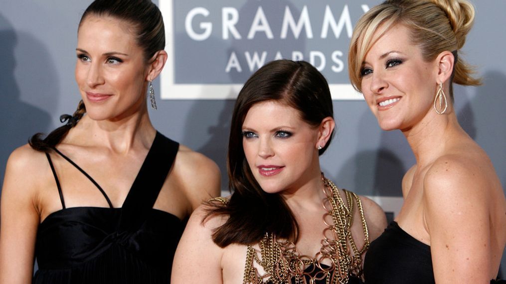 FILE - In this Feb. 11, 2007 file photo, the Dixie Chicks, Emily Robison, left, Natalie Maines, center, and Martie Maguire arrive for the 49th Annual Grammy Awards in Los Angeles. (AP Photo/Matt Sayles, File)