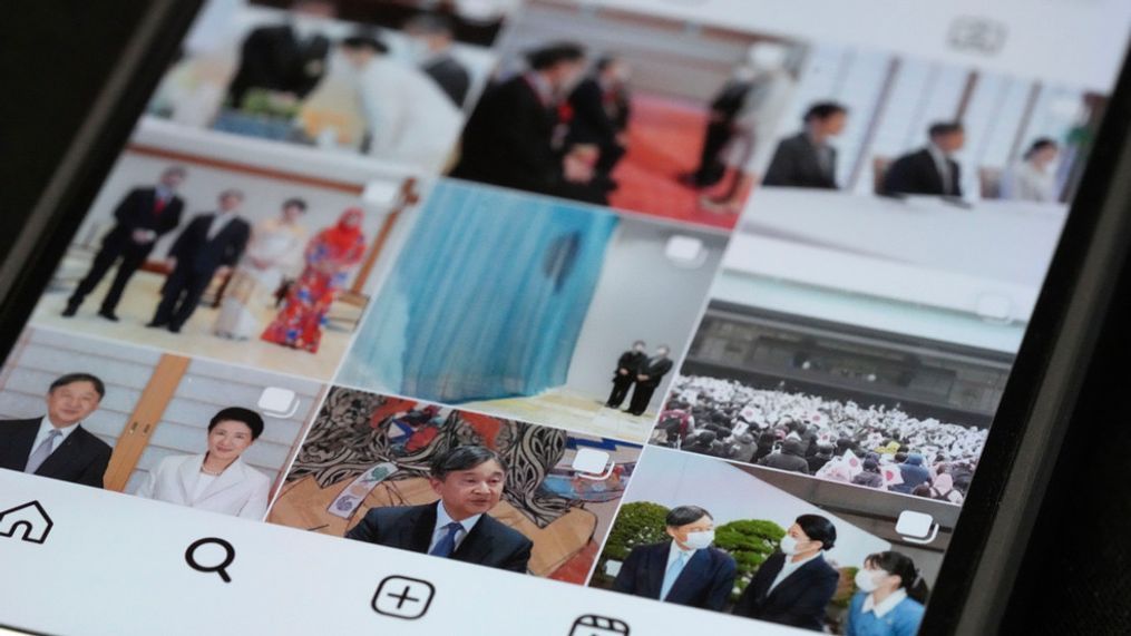 The part of the instagram page of Japan's Imperial Household Agency is seen on a mobile phone Monday, April 1, 2024, in Tokyo. Japanâs Imperial Family made an Instagram debut on Monday, with images of Emperor Naruhito and Empress Masako capturing moments of their official duties, an effort to shake off their cloistered image and reach out to the younger generations.(AP Photo/Eugene Hoshiko)