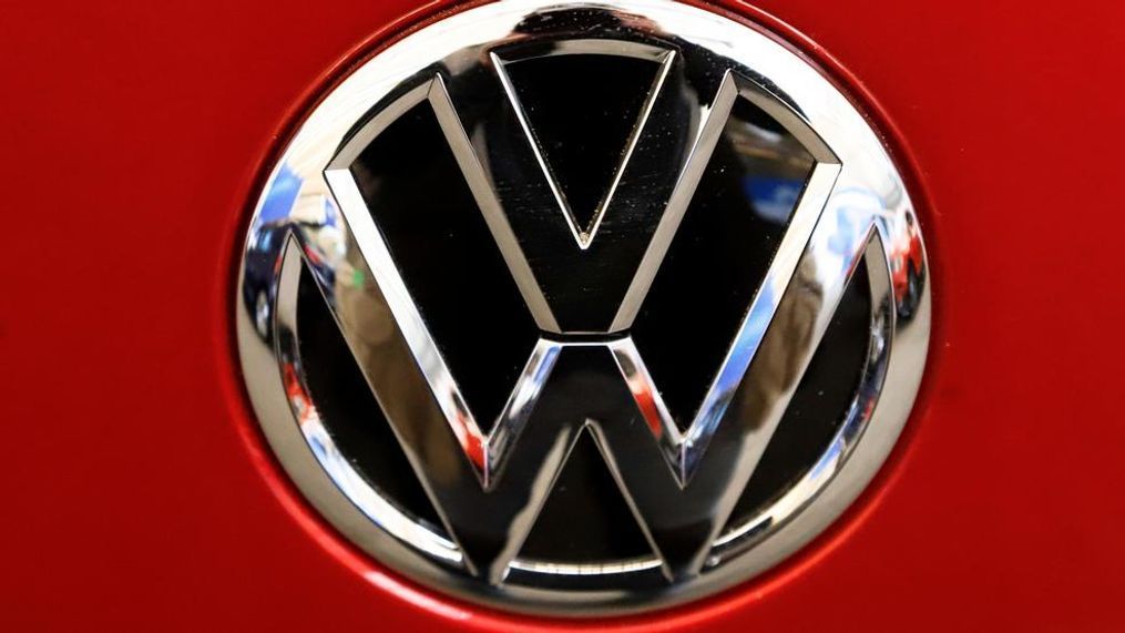 This Thursday, Feb. 14, 2019, file photo, shows the Volkswagen logo on an automobile at the 2019 Pittsburgh International Auto Show in Pittsburgh. The U.S. Environmental Protection Agency is making Volkswagen Group correct fuel economy labels for about 98,000 gasoline-powered vehicles from the 2013 through 2017 model years. (AP Photo/Gene J. Puskar, File)