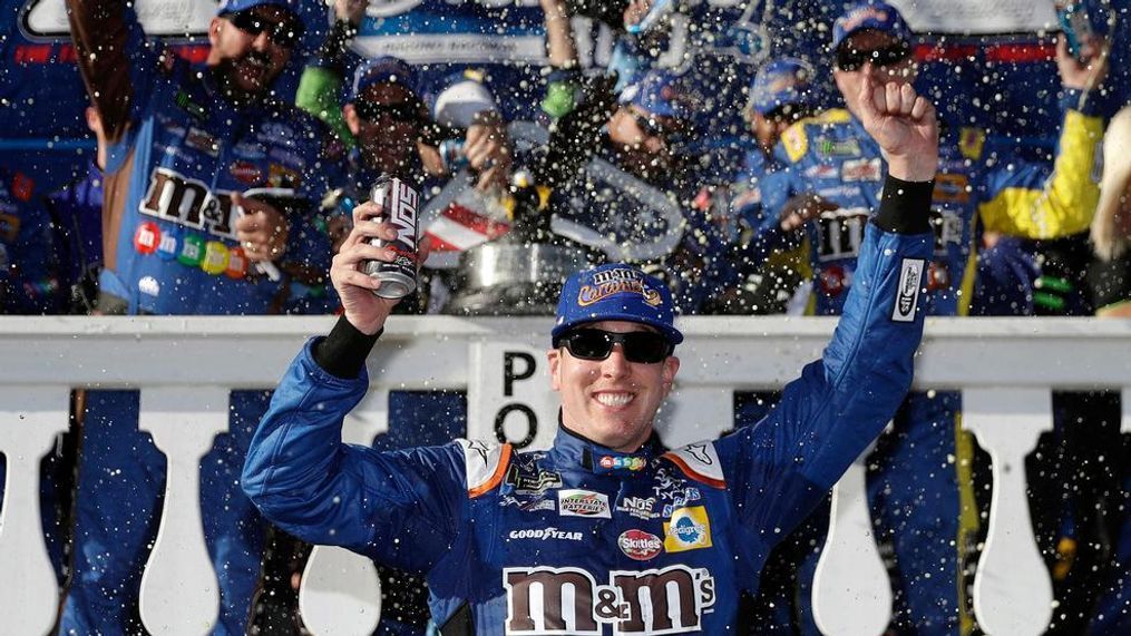 Kyle Busch celebrates after winning the NASCAR Cup Series auto race at Pocono Raceway, Sunday, July 30, 2017, in Long Pond, Pa. (AP Photo/Matt Slocum)