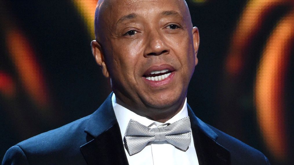 FILE - In this Feb. 6, 2015, file photo, hip-hop mogul Russell Simmons presents the Vanguard Award on stage at the 46th NAACP Image Awards in Pasadena, Calif. (Photo by Chris Pizzello/Invision/AP, File)