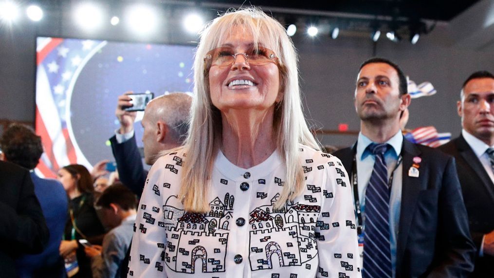 FILE - Miriam Adelson, wife of Las Vegas Sands Corporation Chief Executive and Republican mega donor Sheldon Adelson, listens as President Donald Trump speaks at the Israeli American Council National Summit in Hollywood, Fla., Saturday, Dec. 7, 2019. (AP Photo/Patrick Semansky)