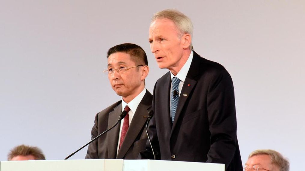 In this photo released by Nissan Motor Co., Renault Chairman Jean-Dominique Senard, center right, and Nissan Chief Executive Hiroto Saikawa, center left, attend the company's shareholders' meeting in Tokyo Monday, April 8, 2019. Nissan shareholders have approved the ouster of former chairman Carlos Ghosn from its board. The approval Monday was shown by applause from the shareholders gathered at a Tokyo hotel. Ahead of the vote, Nissan Chief Executive Saikawa apologized for the scandal at the Japanese automaker. Ghosn has been arrested on financial misconduct charges. Shareholders also okayed the appointment of Renault Chairman Senard to replace Ghosn. (Nissan Motor Co. via AP)