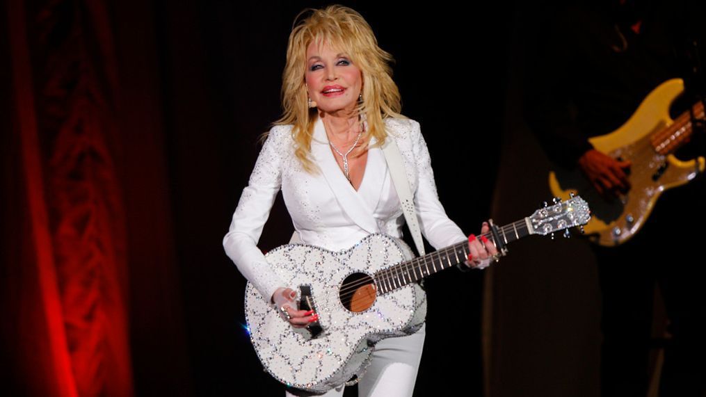 FILE – In this July 31, 2015 file photo, Dolly Parton performs in concert at the Ryman Auditorium in Nashville, Tenn. (Photo by Wade Payne/Invision/AP, File)