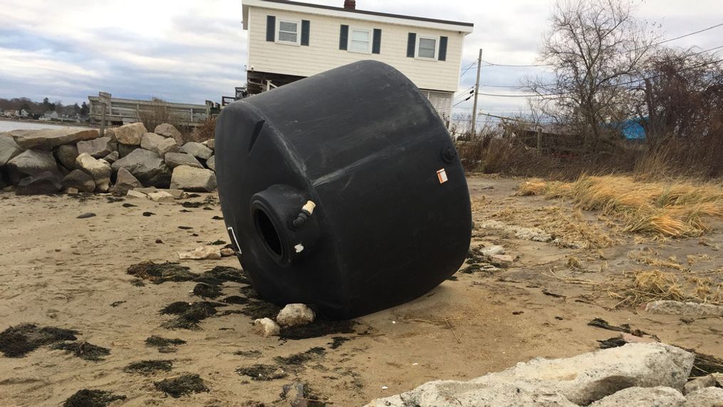 A giant black tank sits on the beach in the Conimicut section of Warwick. (Debbie/Chime in)